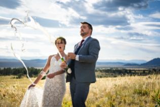 Tara and Eric's summer wedding at Tihsreed Lodge in Florissant, CO.
